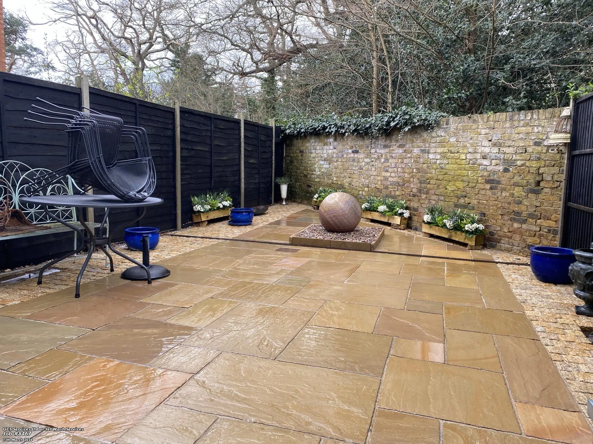 Clean patio in garden in Woking.