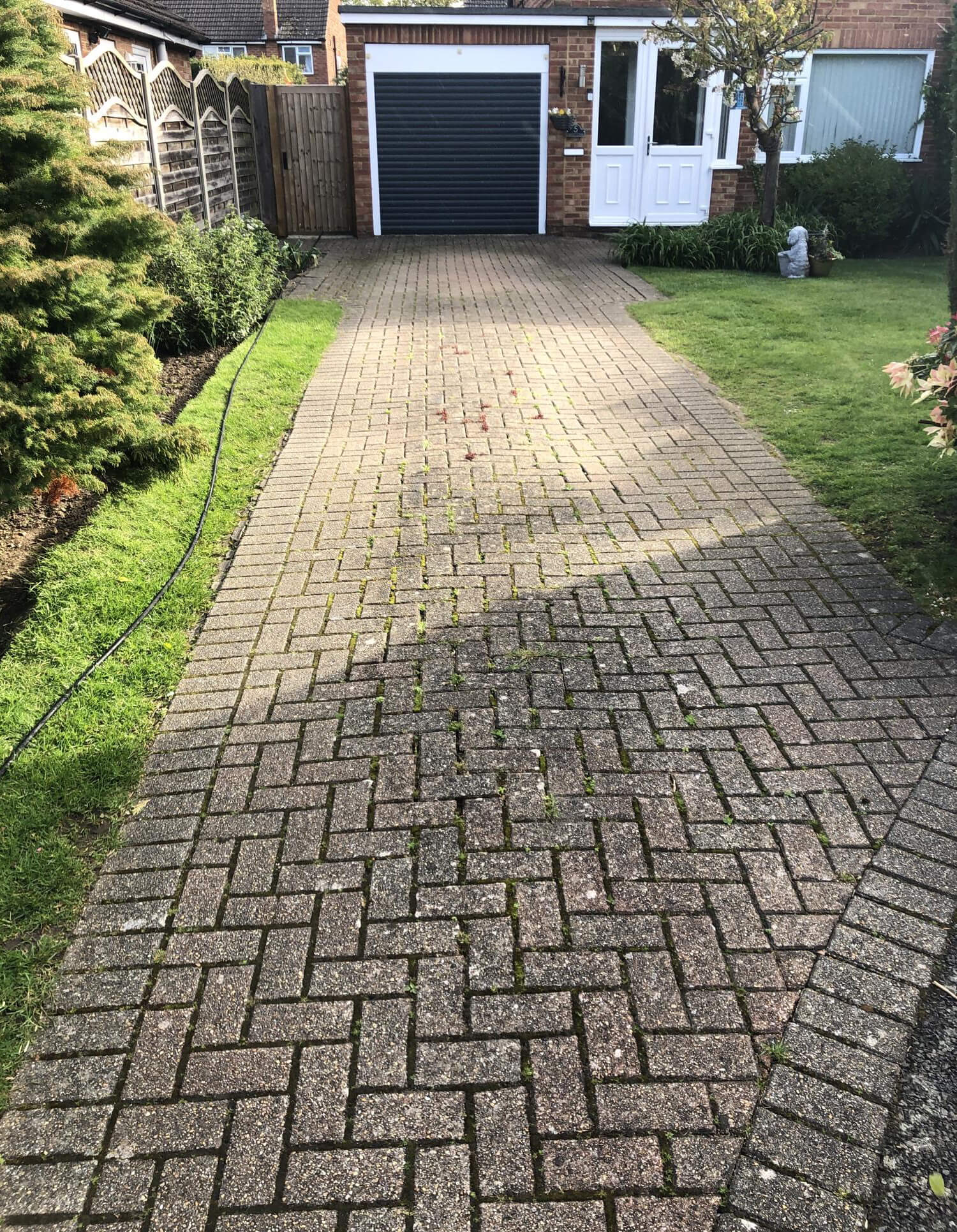 Brick driveway cleaning service in Epsom, Surrey.